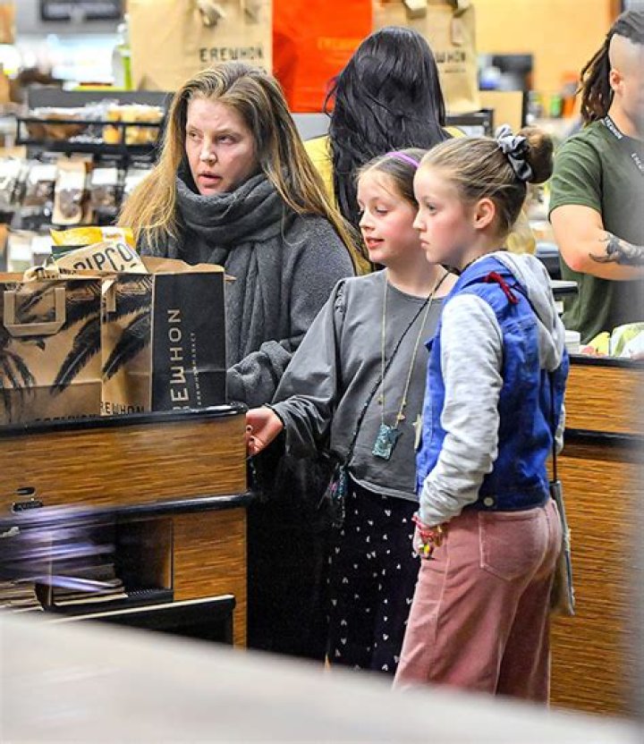 Lisa Marie Presley’s Twin Daughters Harper & Finley, 14, Dig Into Frozen Yogurt With Dad: Rare Photos