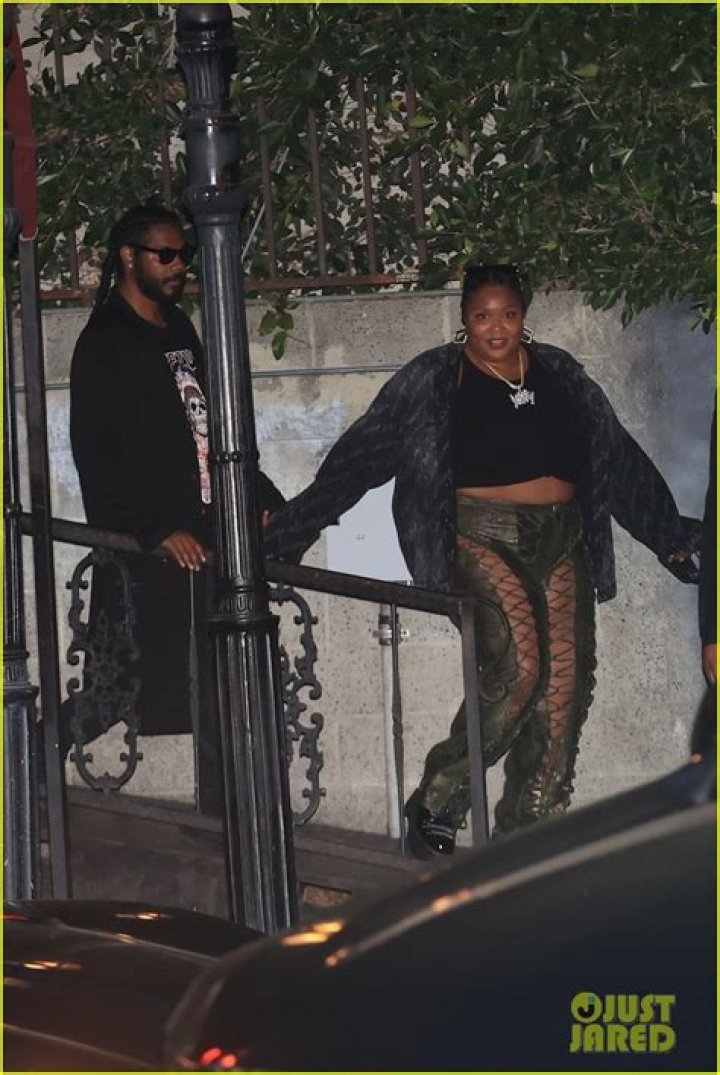 Lizzo Holds Hands With Her Mystery Boyfriend As She Arrives At 34th Birthday Party