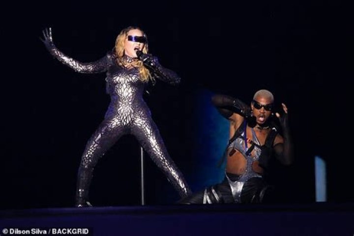 Madonna, 61, & Backup Dancer BF, 25, Have Been Dating For A Year, His Dad Confirms