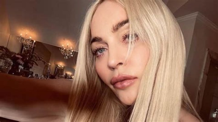 Madonna, 62, Is Nearly Unrecognizable With Platinum Blonde Hair & A Green Robe In New Selfies
