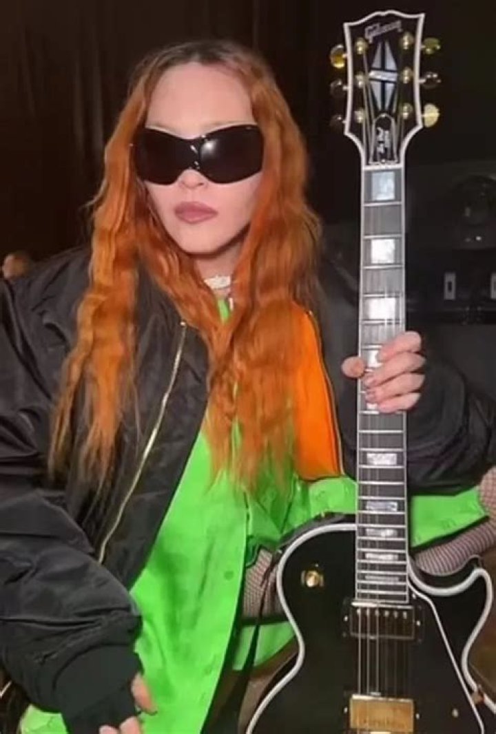 Madonna Licks Guitar While Rocking Fishnets In Sexy New Video – Hollywood Life