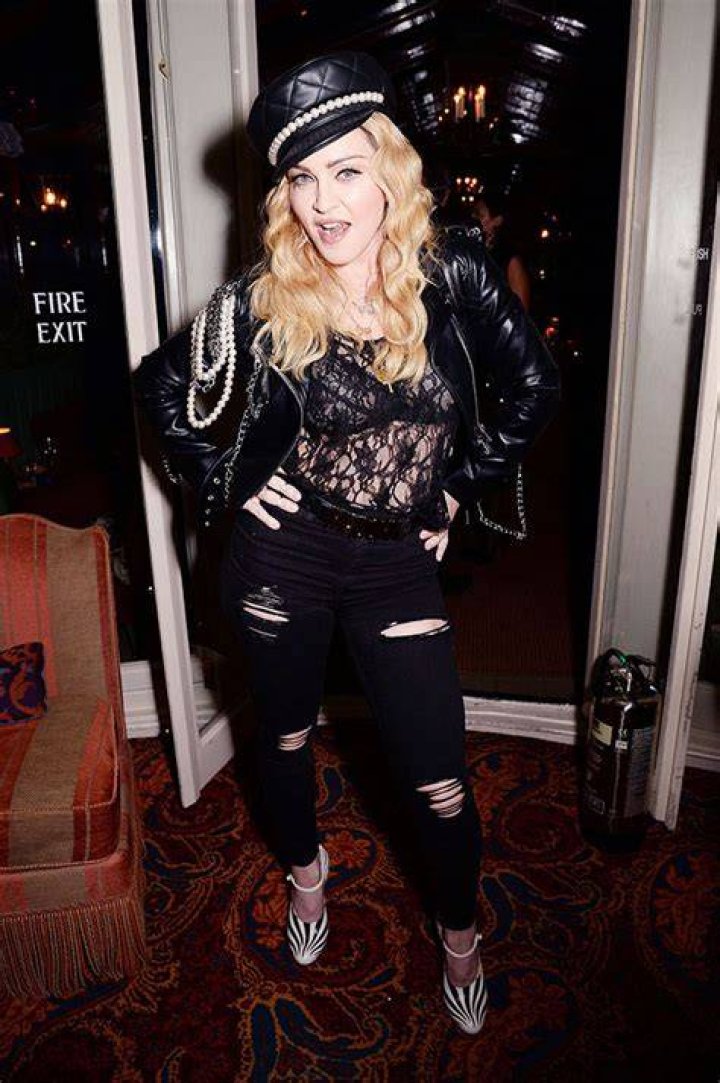 Madonna Rocks Low-Cut Black Corset Top While Studying Lines In The Bathroom — Photos