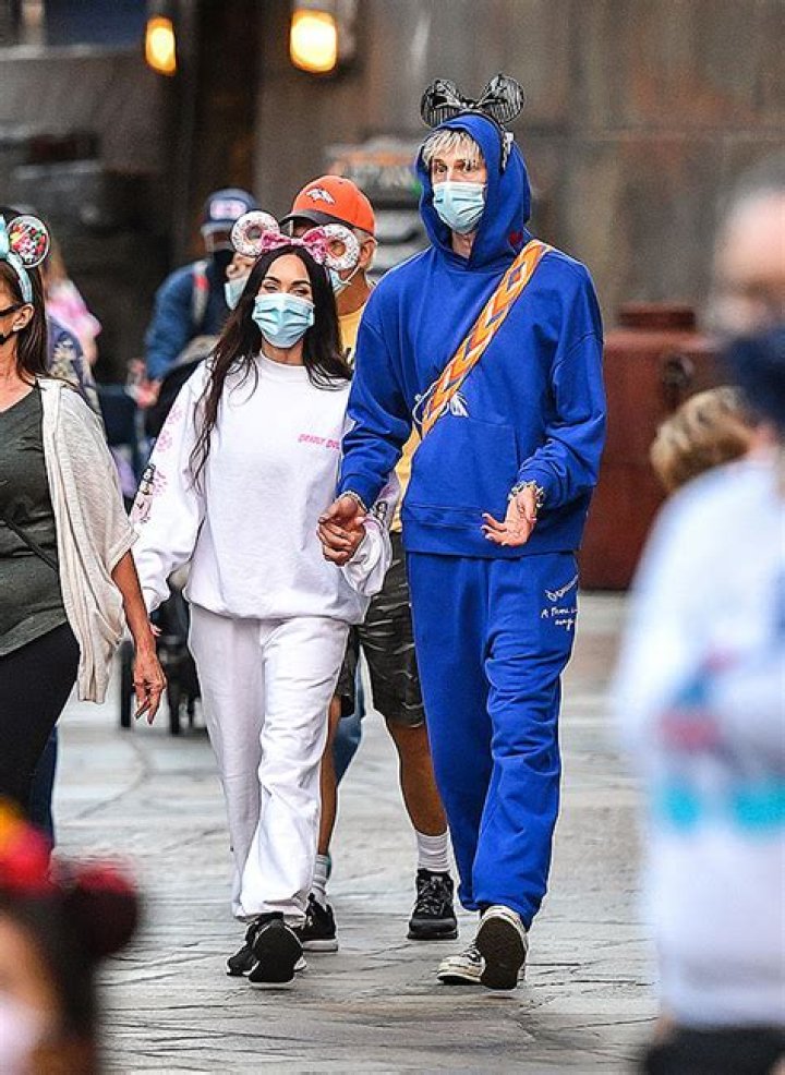 Megan Fox & Machine Gun Kelly Hold Hands During Cute Disneyland Date – See PDA Pics