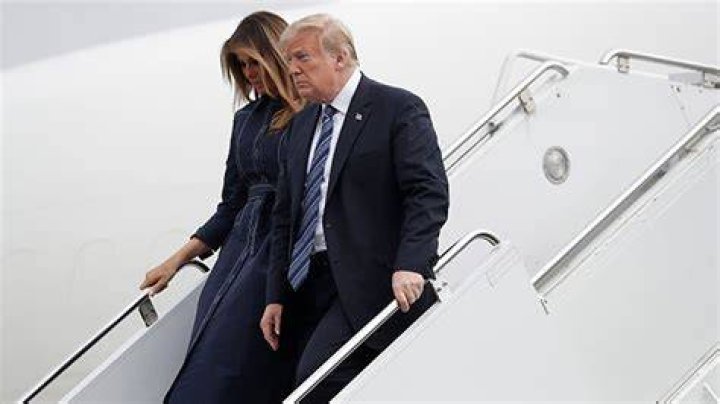 Melania Trump’s Chest Looks Huge In Tight Raincoat Amidst Speculation She Got A Boob Job