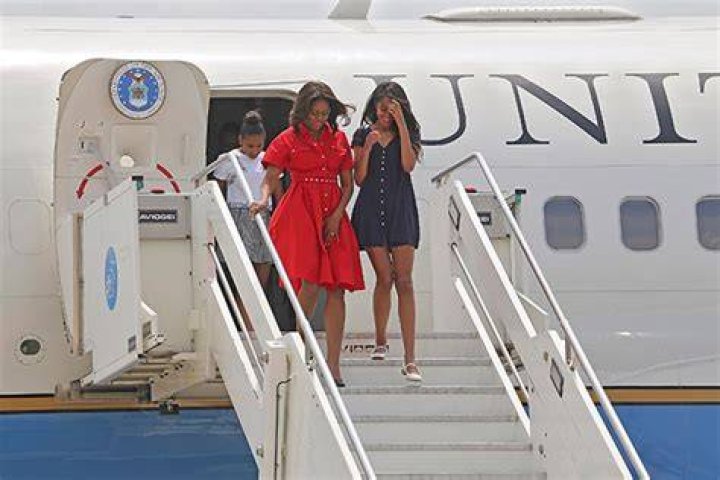 Michelle Obama Narrowly Avoids Wardrobe Malfunction As Dress Blows Up