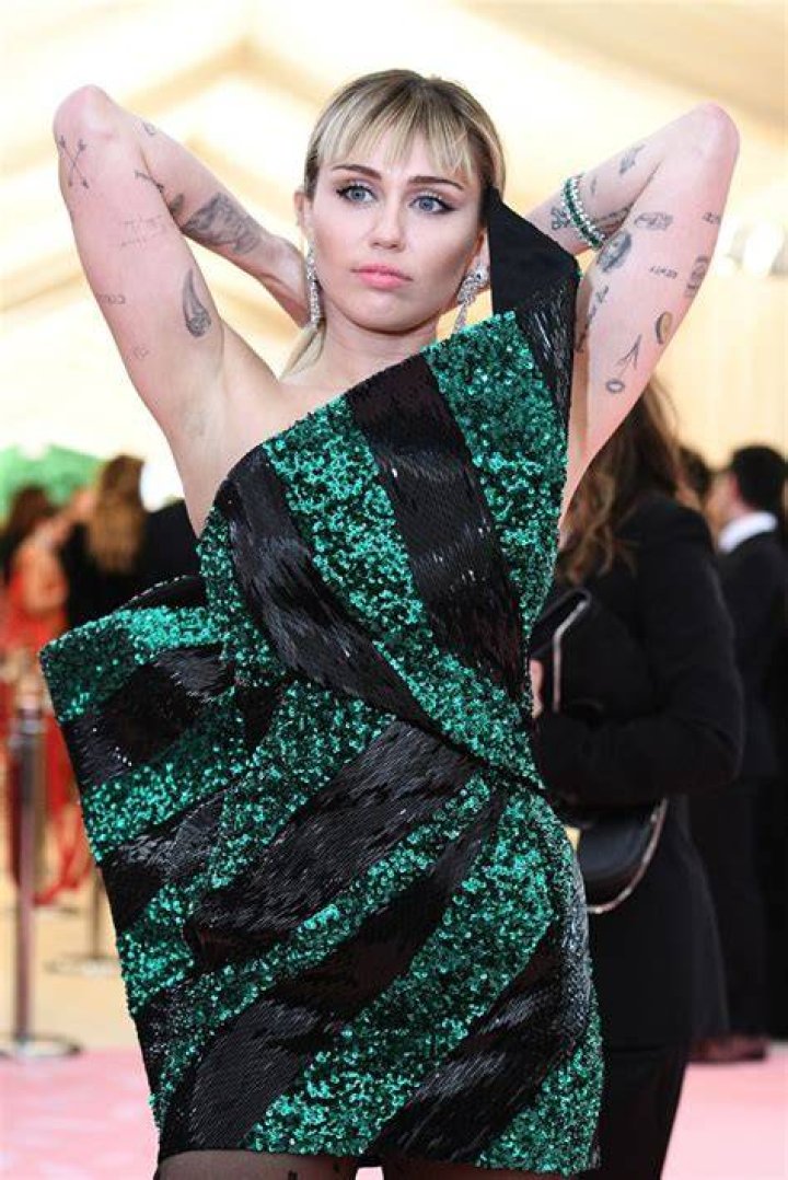 Miley Cyrus’ Met Gala Outfits Through The Years: Photos – Hollywood Life