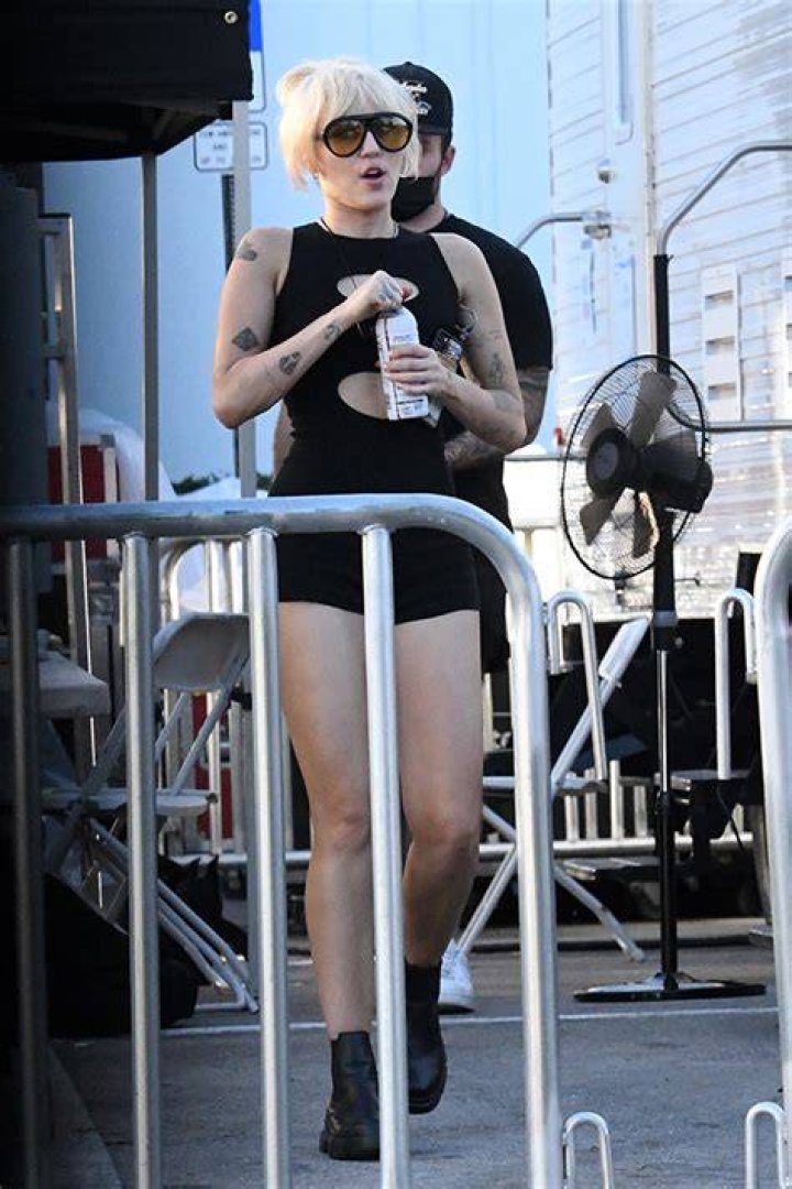 Miley Cyrus Rocks Mini Black Romper With Short Shorts For Miami NYE Show Rehearsal – Photos
