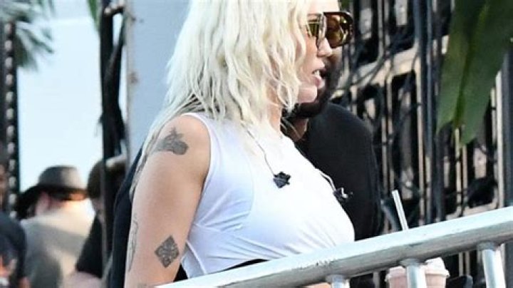 Miley Cyrus Rocks White Crop Top In New Video From Her ‘Pre-Game Turn Up’ Before Super Bowl
