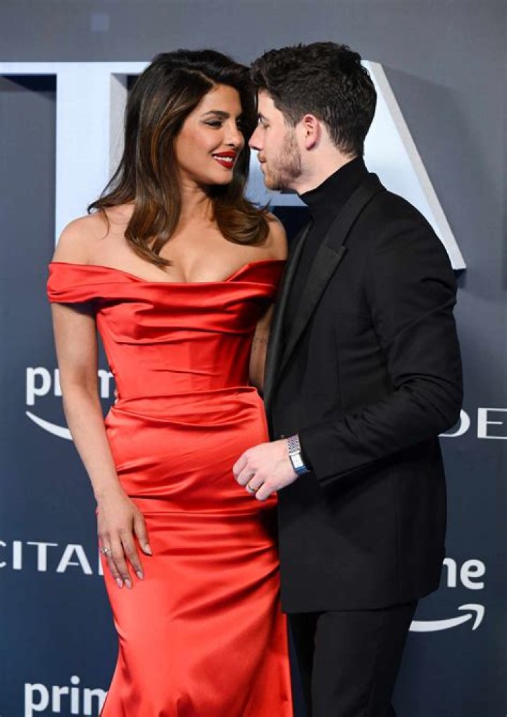 Nick Jonas & Priyanka Chopra Are Twinning In NYC With Matching Orange Clothing — Pics