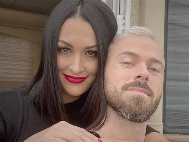Nikki Bella & Fiancé Artem Chigvintsev ‘Closer Than Ever’ After Birth Of Their Son