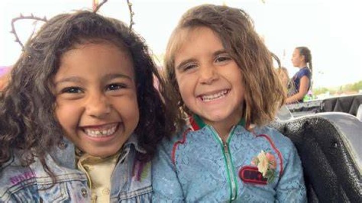 North West, 7, & Cousin Penelope Disick, 8, Are So Cute ‘Daydreaming’ On The Beach — See Pics