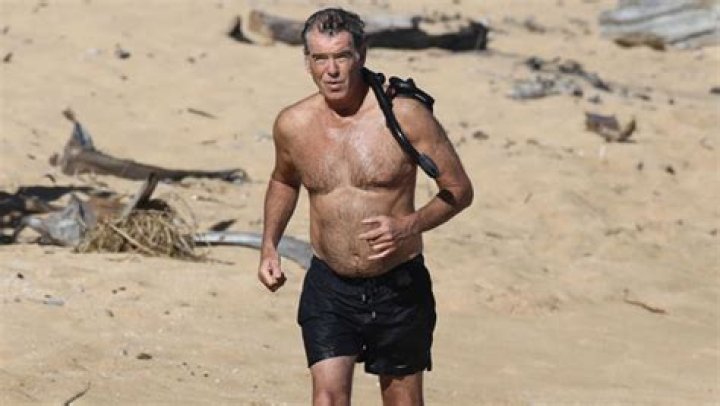 Pierce Brosnan, 67, Looks Super Buff While Running On The Beach Shirtless — Pics
