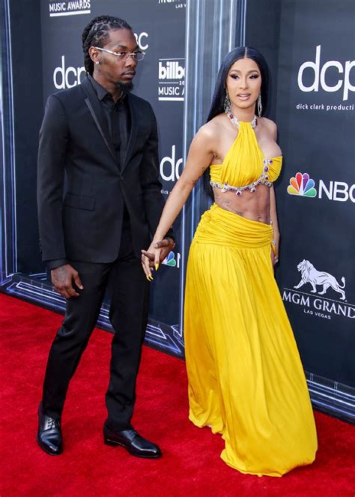 Pregnant Cardi B Shows Off Her Baby Bump In Colorful Catsuit As Offset Pats Her Butt — Photos