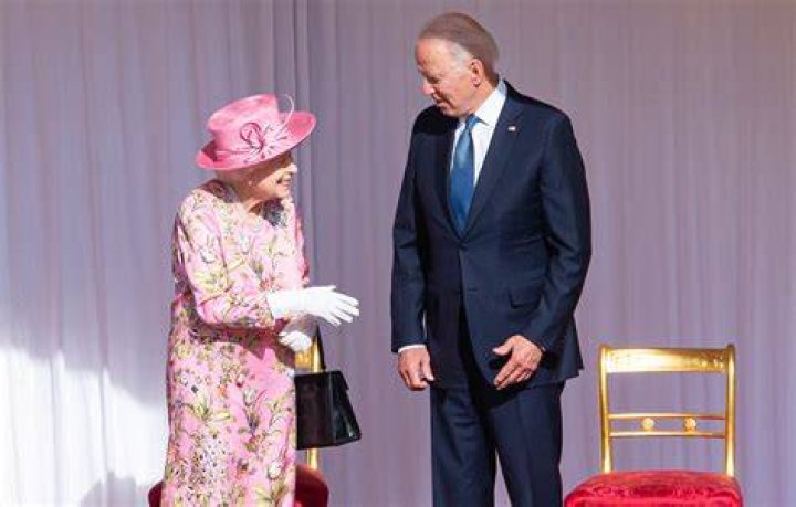 Queen Elizabeth Is Regal In Pink Dress As She Hosts Joe & Jill Biden For Tea At Windsor Castle — Pics