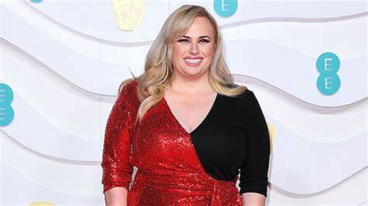 Rebel Wilson Looks Like A Knockout While Bowling In Pink Mini Dress For New Movie ‘Senior Year’