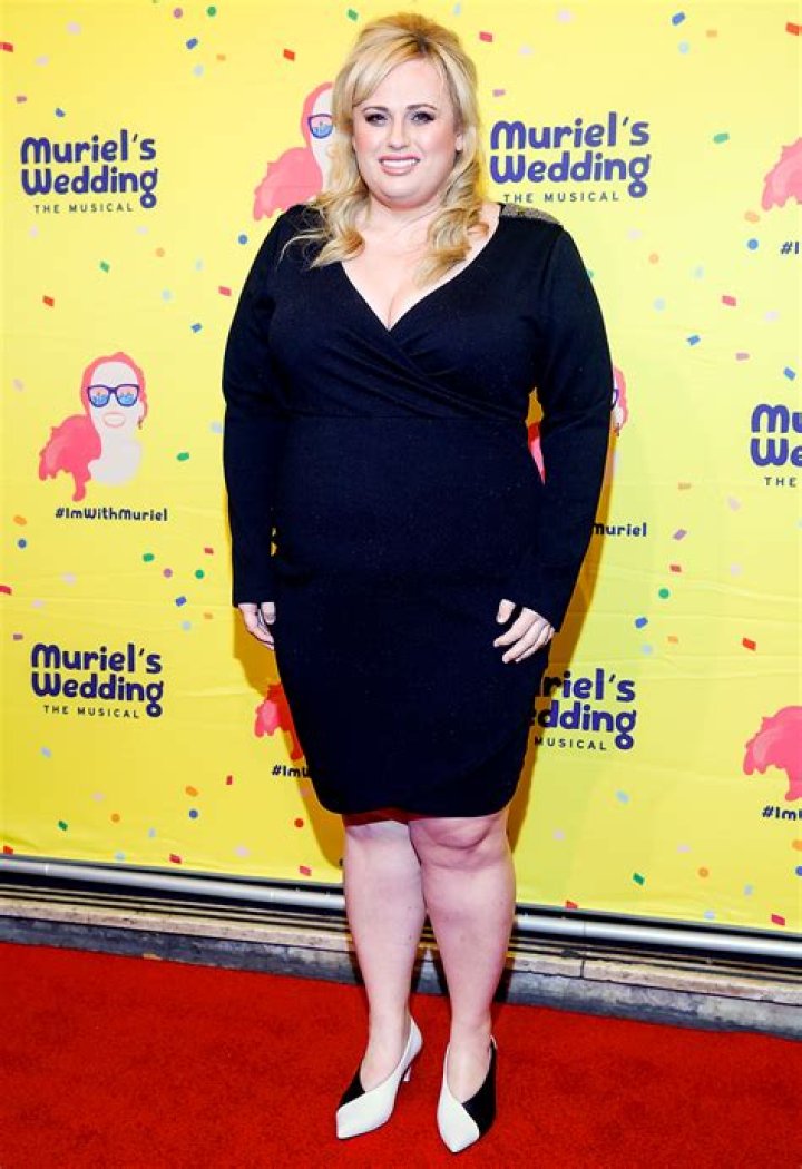 Rebel Wilson Looks Slimmer Than Ever In Sexy Black Dress With Plunging Neckline
