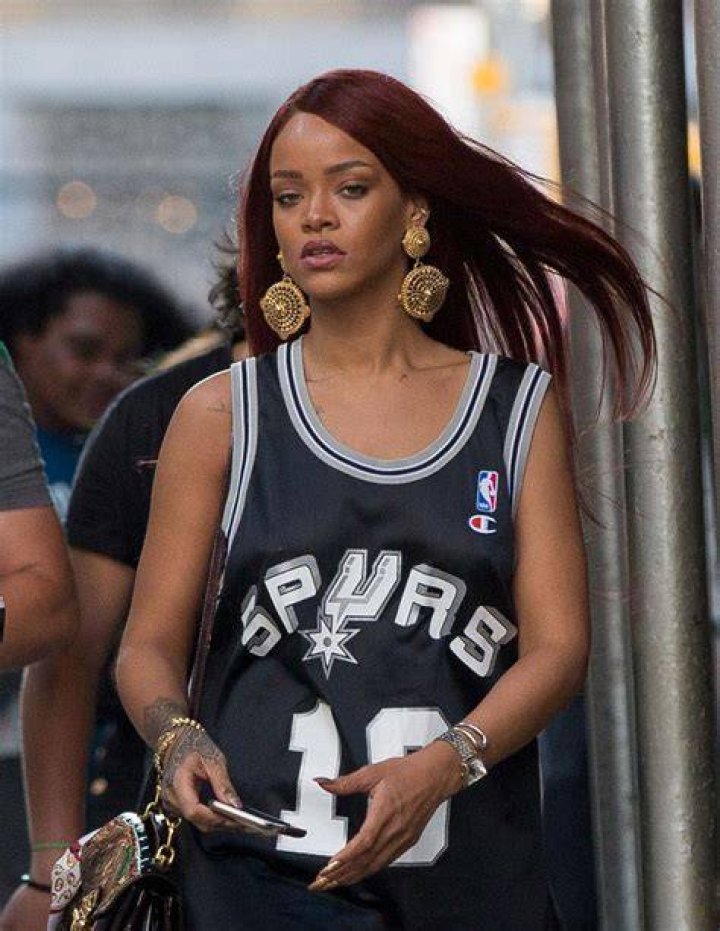 Rihanna Goes Braless In Sexy Tanktop At Basketball Game