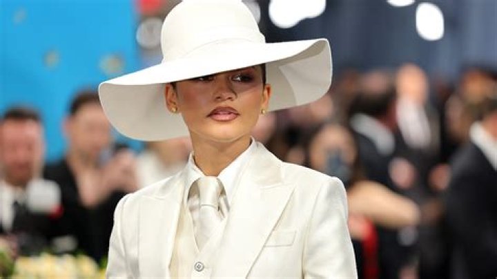 Rihanna Rocks Waist Length Braids & Head-To-Toe White Outfit At Cricket World Cup — See Pics