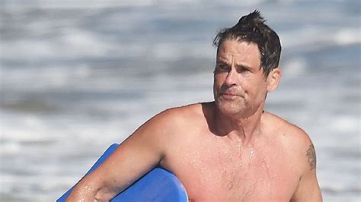 Rob Lowe, 56, Is Hunkier Than Ever Going Shirtless Boogie Boarding With Son Matthew, 27