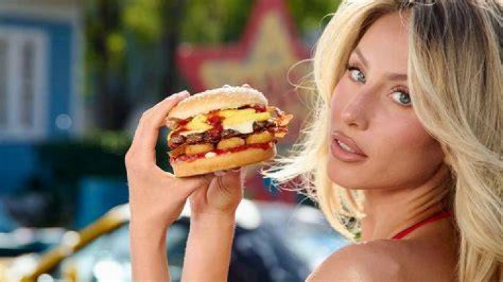 ‘SI’ Model Samantha Hoopes Lounges In Tiny Bikini With New Carl’s Jr. Burger For Sexy Ad