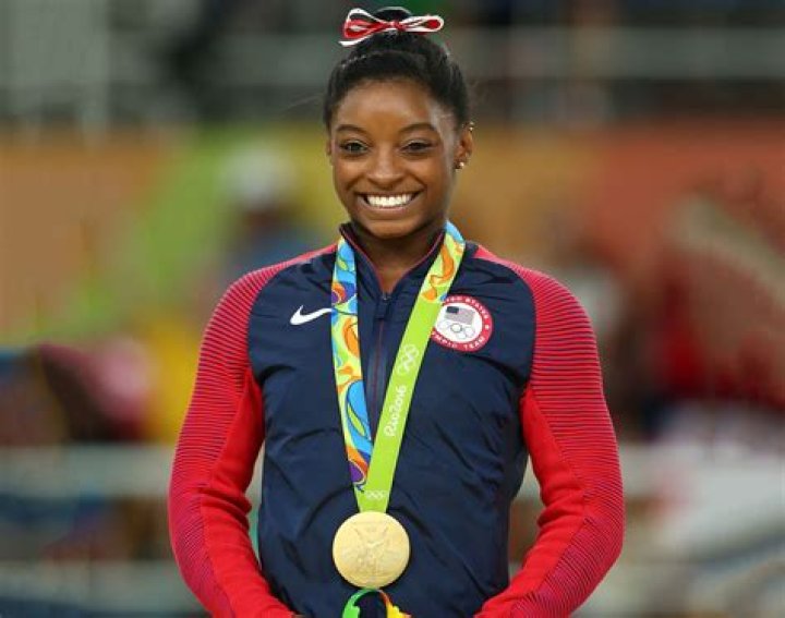 Simone Biles Stuns In A Hot Pink Bikini Amidst Olympic Training & Her BF Is Here For It