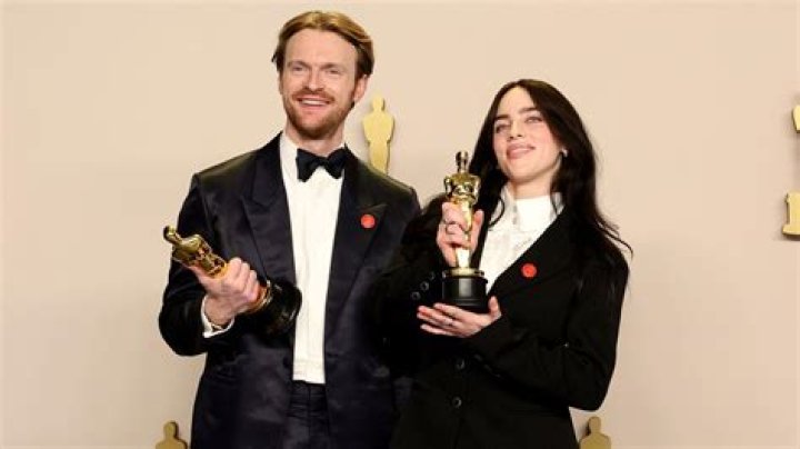 Stars Wearing Orange Pins At The Oscars: What Does It Mean?