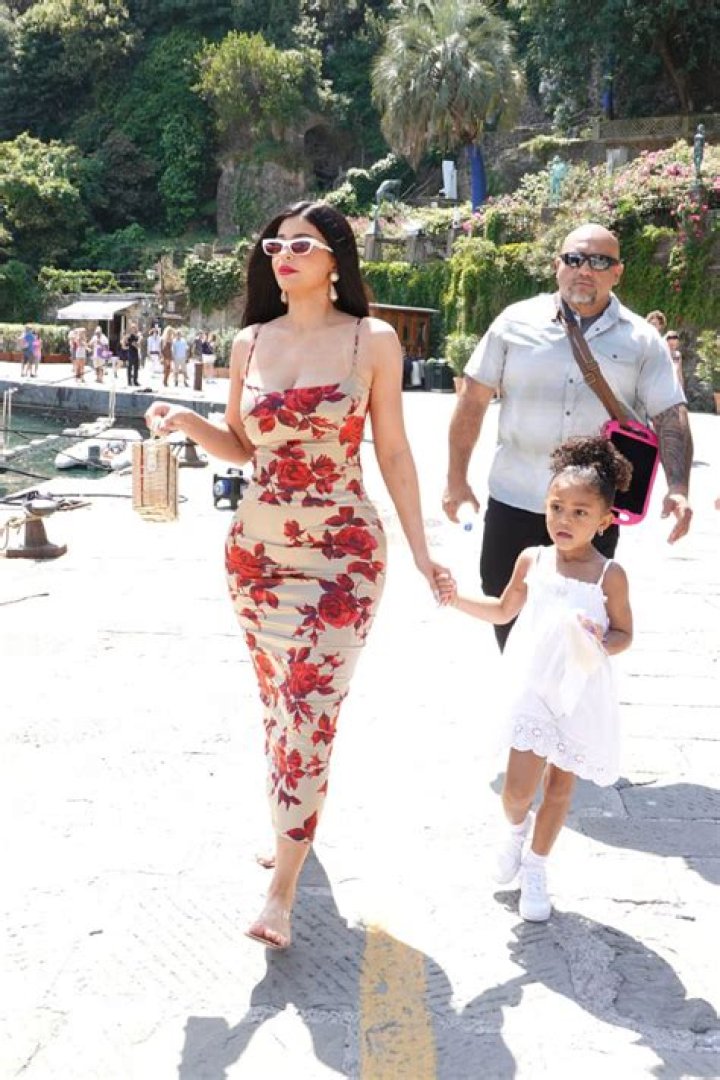 Stormi Webster Rocks Adorable Curls & A White Dressing Gown On Luxury Vacay With Mom Kylie – Pics