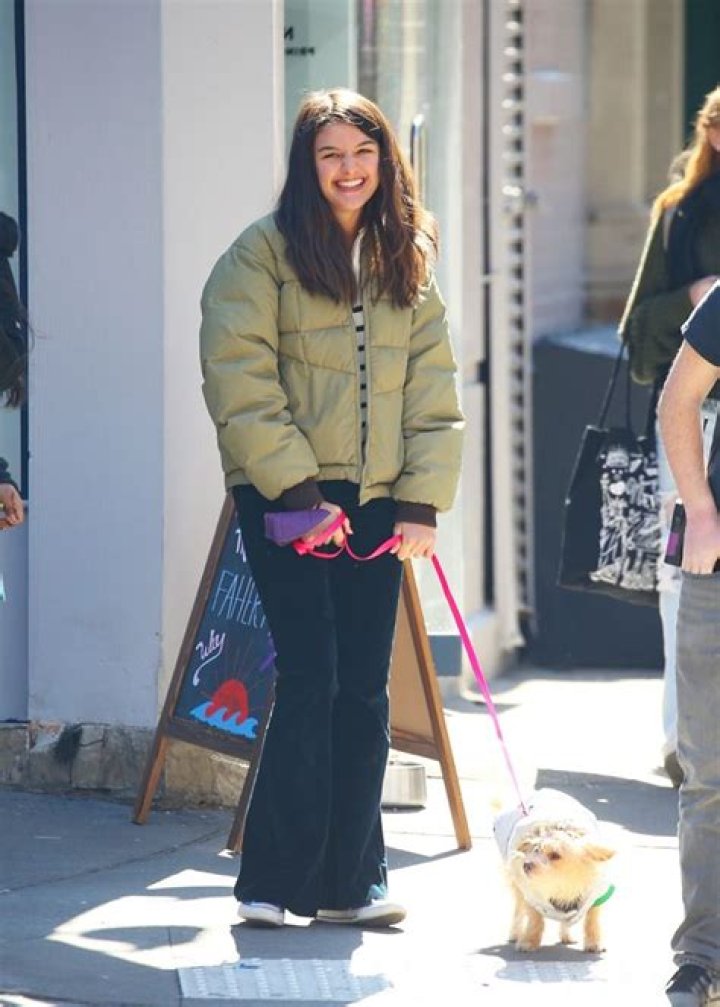Suri Cruise, 15, Seen In 1st Pics Of Her Walking Her Adorable Puppy While Rocking Flared Jeans