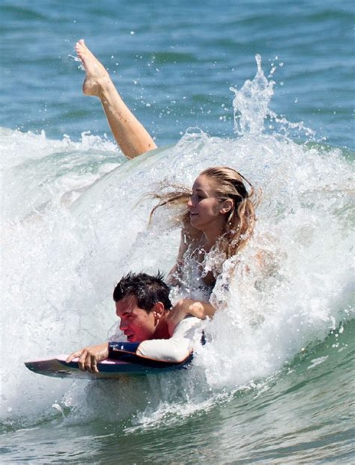 Taylor Lautner Straddled By Sexy Bikini-Clad Model Raina Lawson? — See The Pics