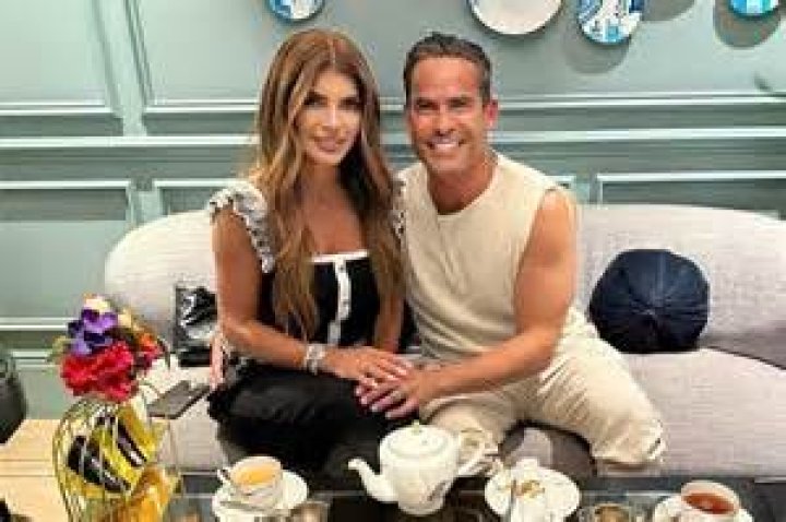 Teresa Giudice, 48, Rocks Sexy Plunging Mini Dress While Cozying Up To BF Louie Ruelas On NYE