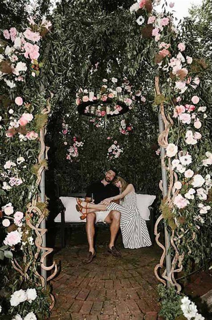 Travis Kelce Steps Out in Striped Outfit & Fans Compare it to Girlfriend Taylor Swift’s ‘Anti-Hero’ Look