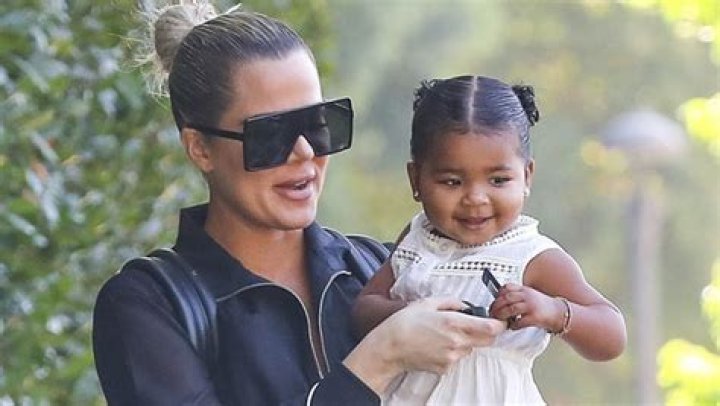 True Thompson, 2, Looks So Cute In $320 Burberry Dress & Kiddie Dr. Martens – See Cute Pics
