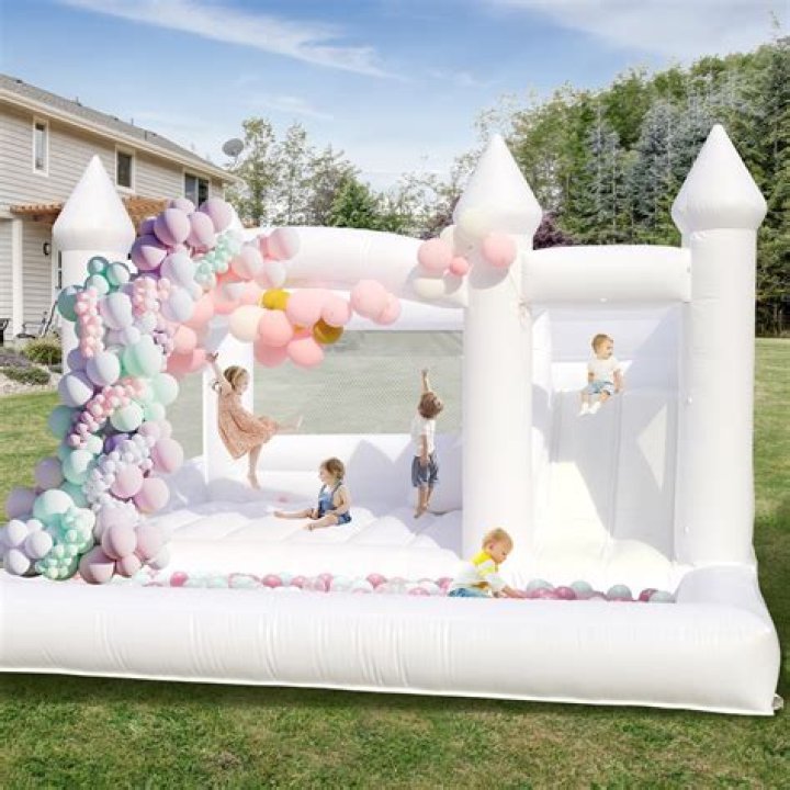 True Thompson Bops Around On An Inflatable Bouncy House During Mommy Khloe’s Birthday Party