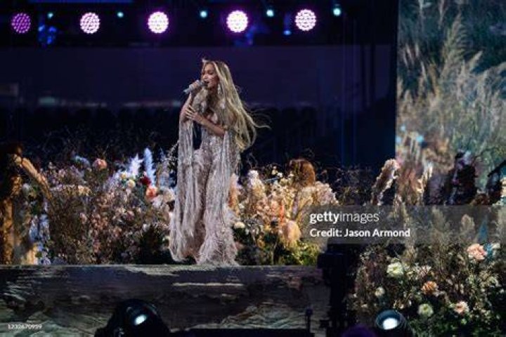 VAX Live Concert: J.LO Sizzles In Sexy Bodysuit, Blonde Selena Gomez, & More Photos