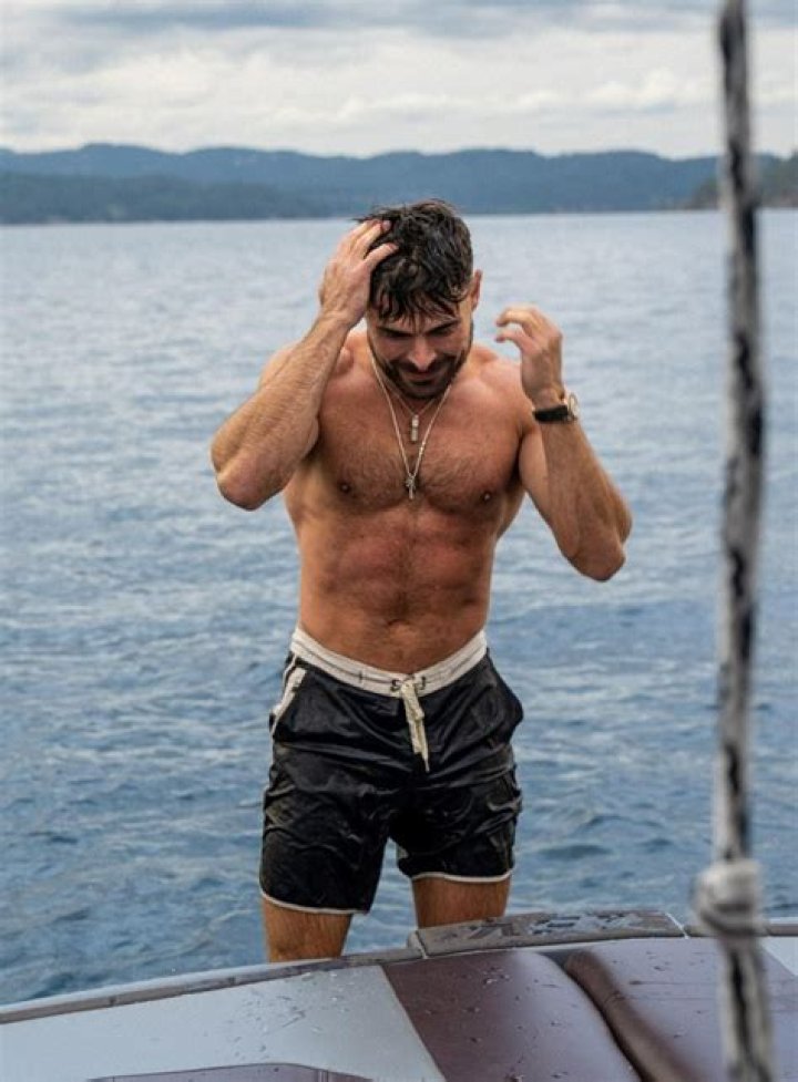 Zac Efron Goes Shirtless & Poses In A Steamy Sauna For Hot New Pic